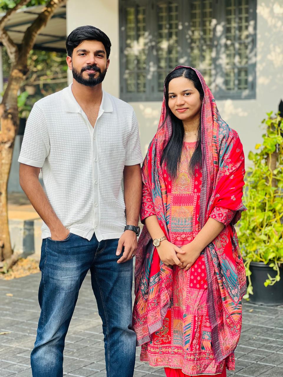 Adhinsha and Jisni celebrating